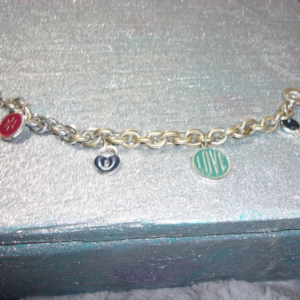 JLR-52 AREOPSOTLE SILVER TONED CHARM BRACELET